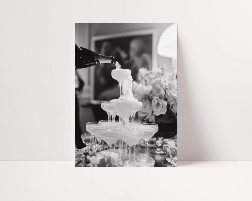 black and white champagne showers vintage glam wall art print leaning against wall