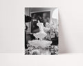 black and white champagne showers vintage glam wall art print leaning against wall