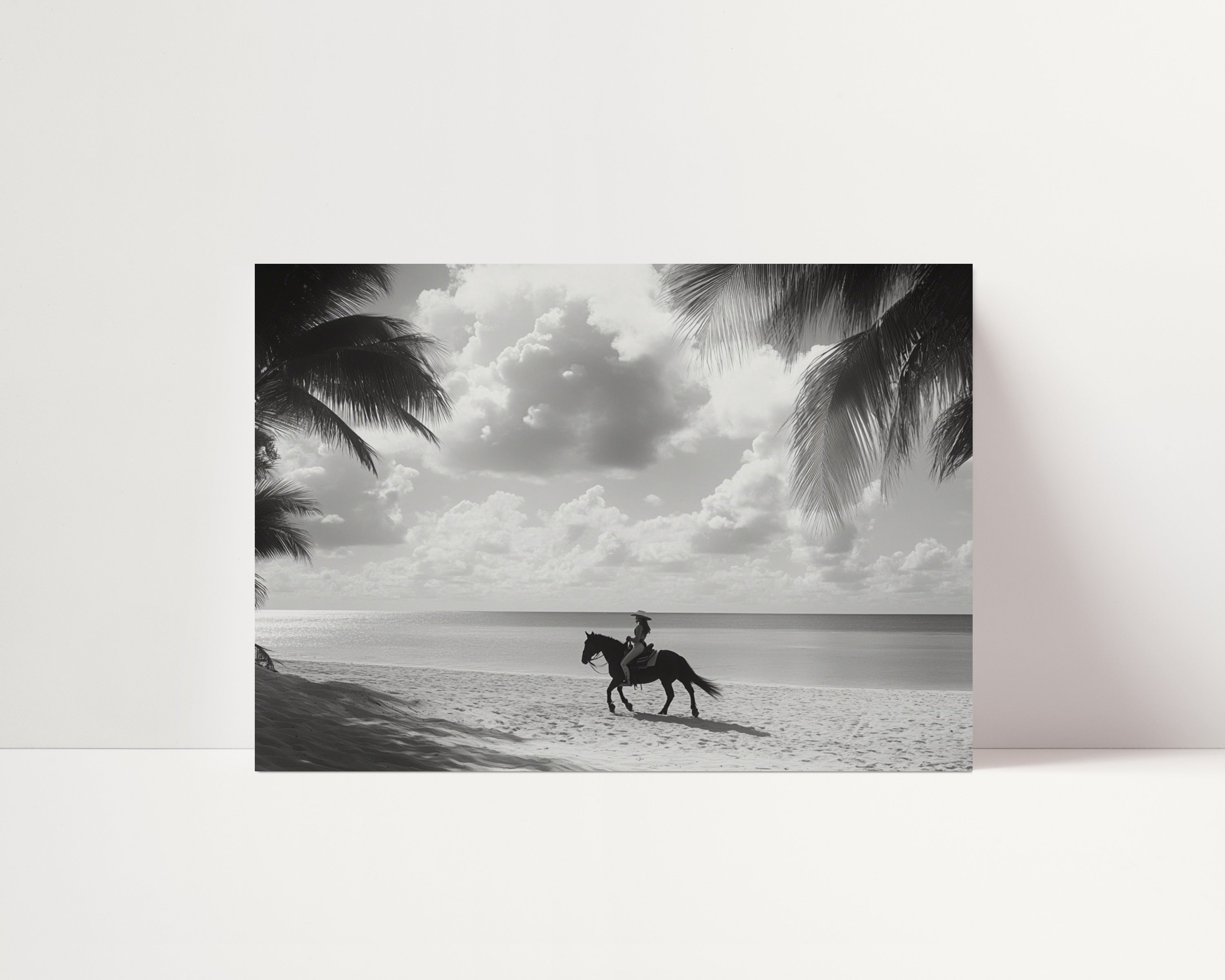 coastal cowgirl riding horse on the beach with palm trees and cloudy skys