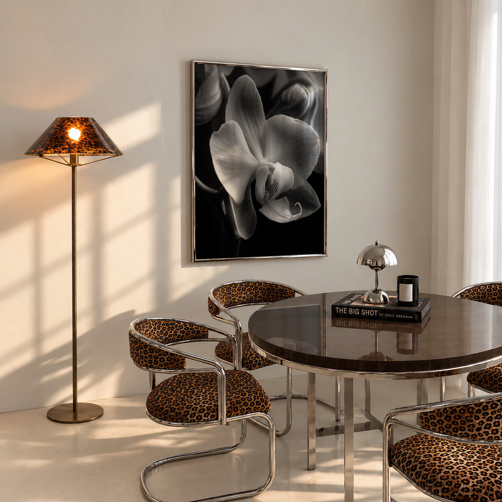 framed floral poster print hanging in dining room with cheetah access