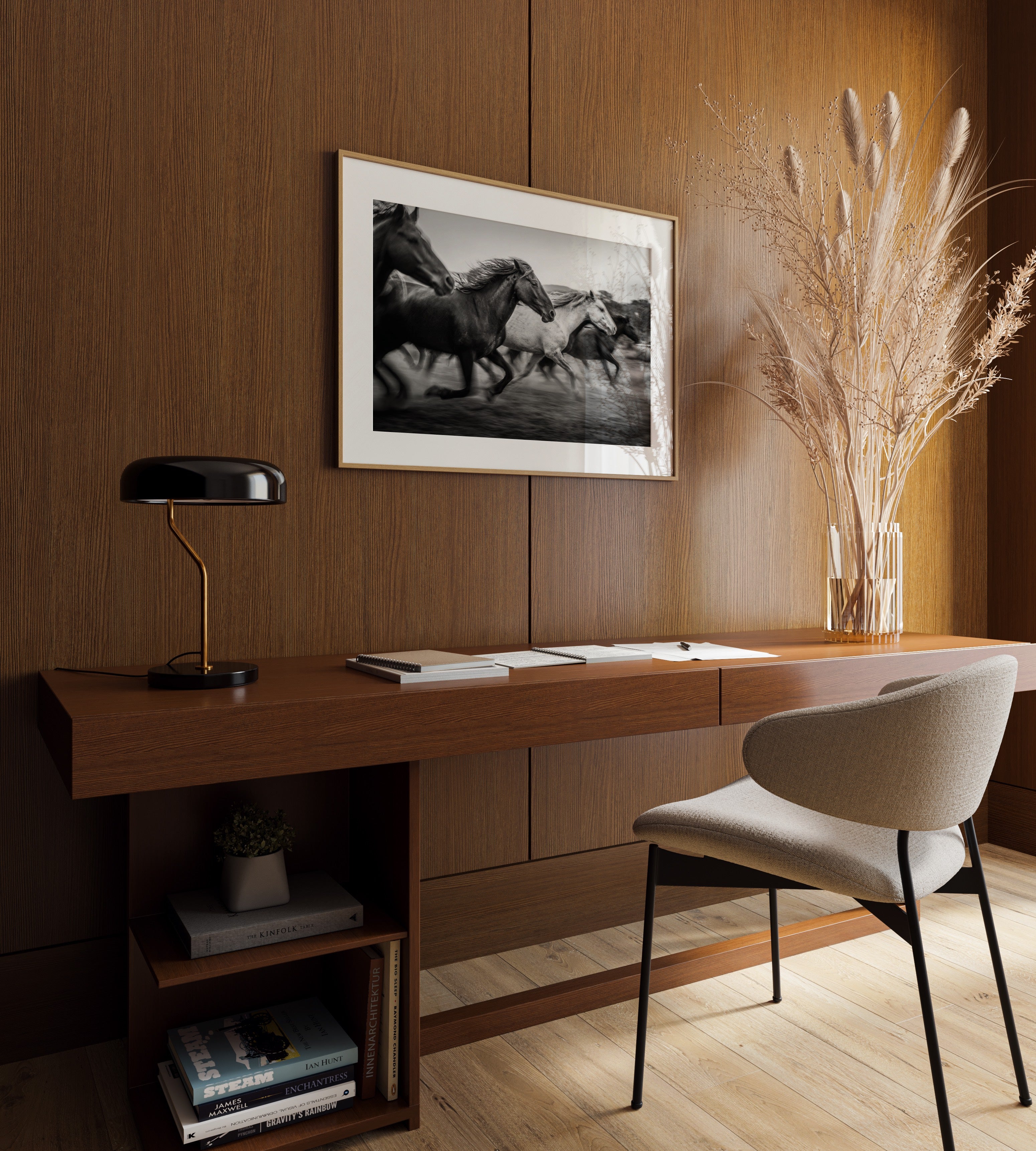 Modern home office with wooden desk, chair, lamp, and Framed black and white freedom wall art