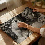 hands holding black and white set in stone marble statue poster print after unboxing