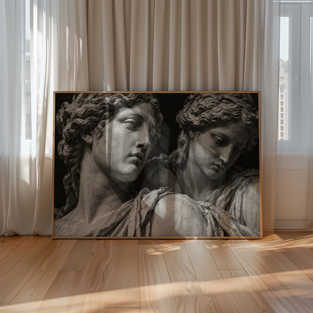 black and white set in stone poster print on floor leaning against windows and curtains