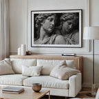 black and white set in stone marble stature wall art poster pring hanging in modern living room above white couch