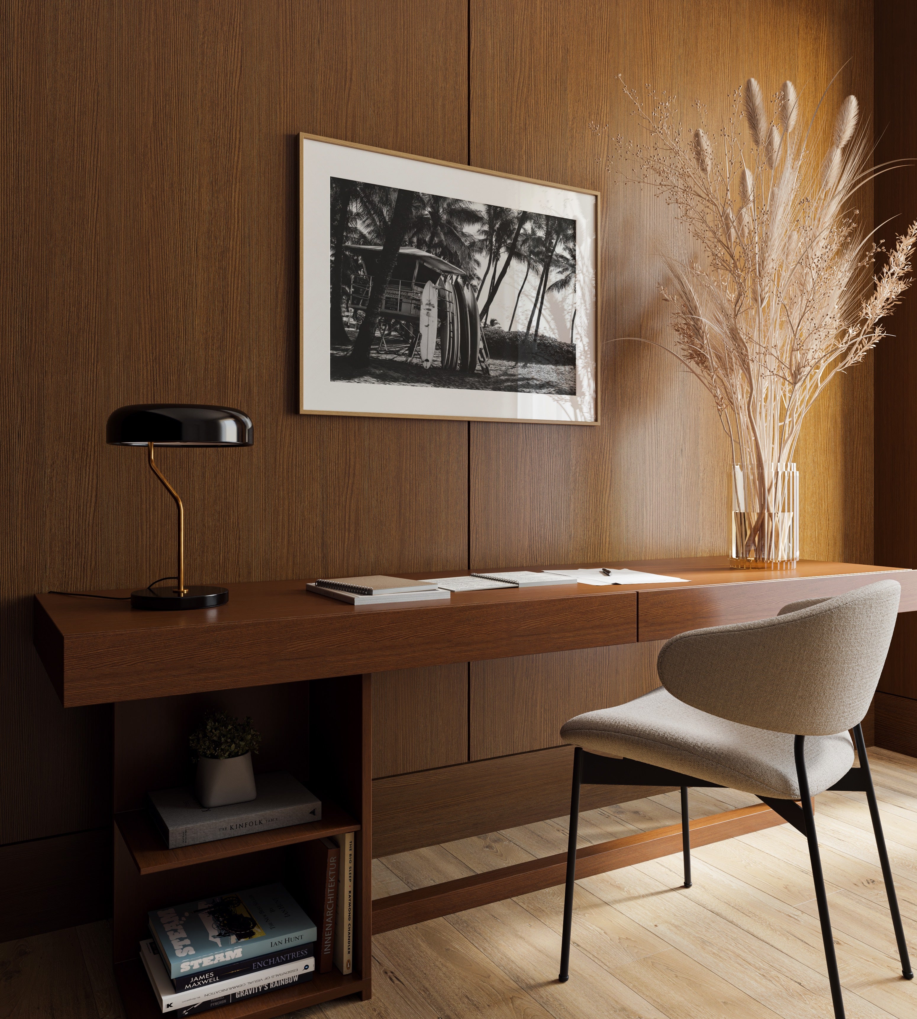 Modern home office with wooden desk, chair, lamp, and Framed black and white Surfs Up poster print 